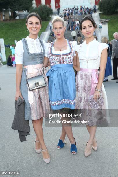 Janina Uhse, Anika Decker and Gizem Emre at the "Madlwiesn" event during the Oktoberfest at Theresienwiese on September 21, 2017 in Munich, Germany.