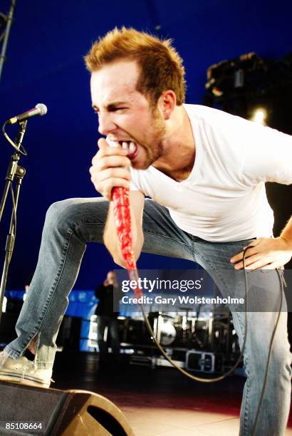 Photo of AUGUST BURNS RED and Jake LUHRS, Jake Luhrs performing on stage