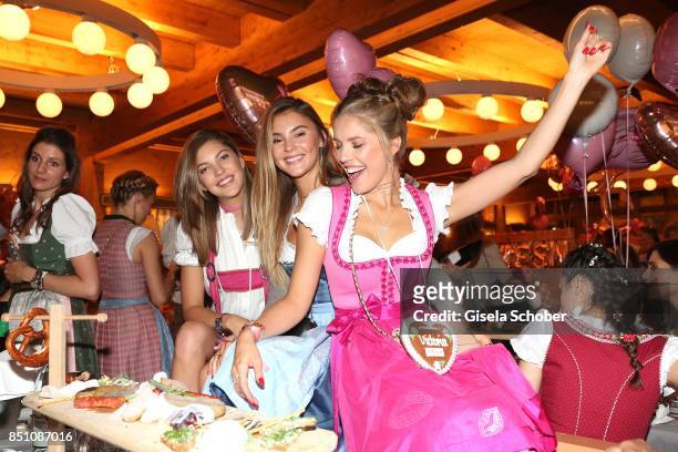 Paulina Swarovski , Stefanie Giesinger and Victoria Swarovski at the "Madlwiesn" event during the Oktoberfest at Theresienwiese on September 21, 2017...
