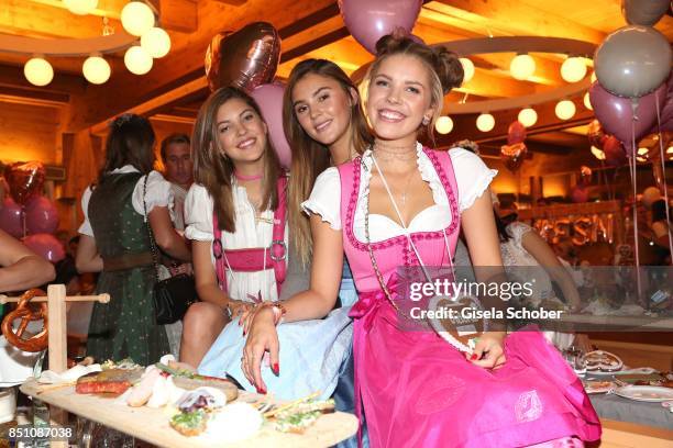 Paulina Swarovski , Stefanie Giesinger and Victoria Swarovski at the "Madlwiesn" event during the Oktoberfest at Theresienwiese on September 21, 2017...