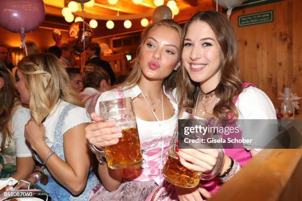 Cheyenne Ochsenknecht and Alana Siegel at the "Madlwiesn" event during the Oktoberfest at Theresienwiese on September 21, 2017 in Munich, Germany.