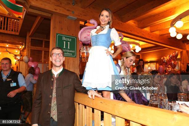 Host Ludwig Reinbold and Blogger, influencer Sophie Hermann at the "Madlwiesn" event during the Oktoberfest at Theresienwiese on September 21, 2017...