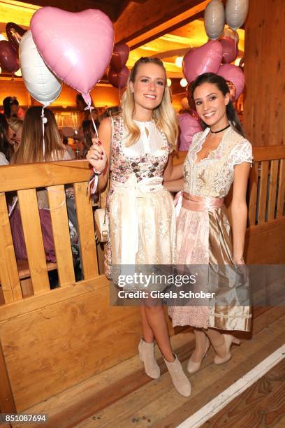 Vanessa Meisinger and Nadine Menz at the "Madlwiesn" event during the Oktoberfest at Theresienwiese on September 21, 2017 in Munich, Germany.