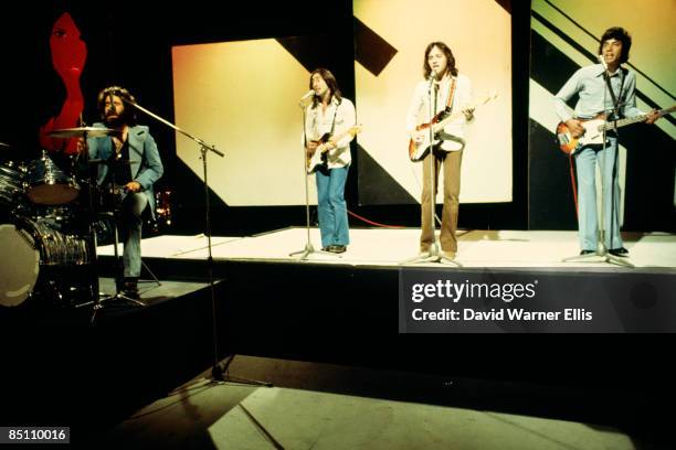 Photo of 10CC and Kevin GODLEY and Lol CREME and Eric STEWART and Graham GOULDMAN; Group performing on stage L-R Kevin Godley, Lol Creme, Eric...