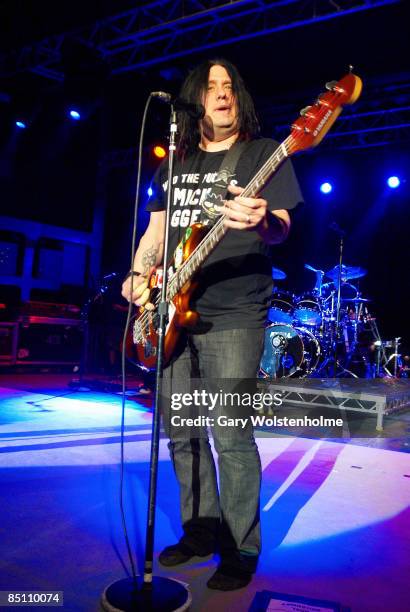 Photo of GOO GOO DOLLS and Robby TAKAC, Robby Takac performing on stage