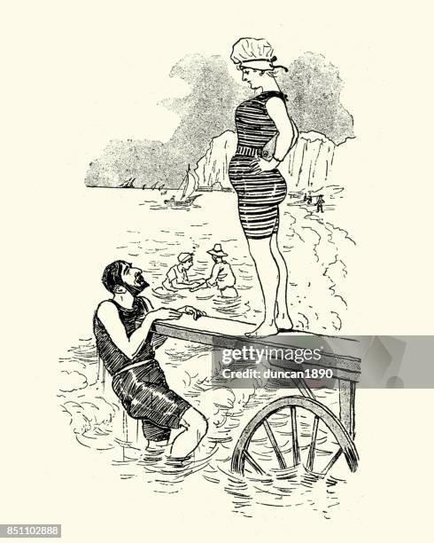victorian man and woman diving into the sea, 1880s - victorian swimwear stock illustrations