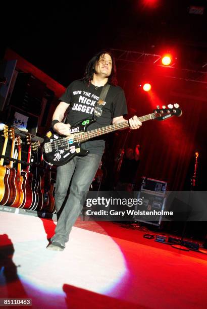 Photo of GOO GOO DOLLS and Robby TAKAC, Robby Takac performing on stage