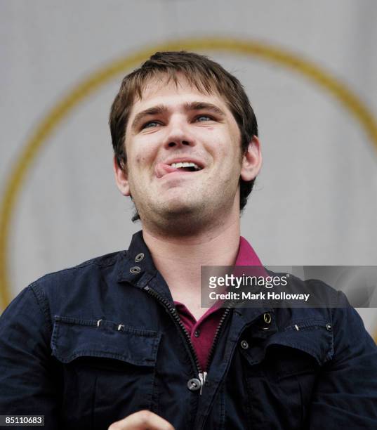 Photo of SCOUTING FOR GIRLS and Roy STRIDE, Roy Stride performing on stage, portrait