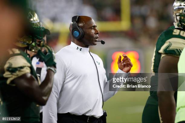 Head coach Charlie Strong of the South Florida Bulls looks on from the sidelines during the second quarter of an NCAA football game against the...