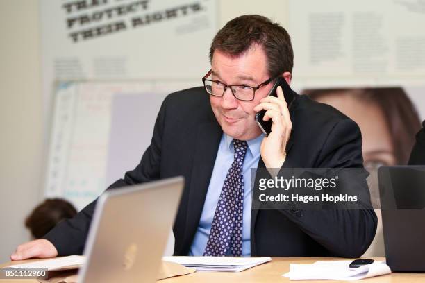 Labour MP Grant Robertson makes a campaign call during a visit to Rongotai candidate Paul Eagle's phone bank on September 21, 2017 in Wellington, New...