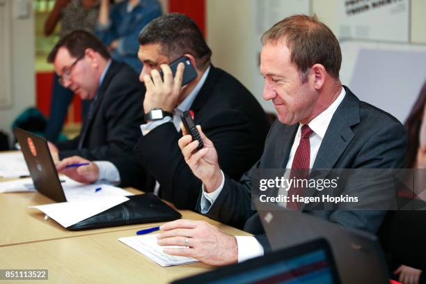 Labour's Rongotai candidate Paul Eagle makes campaign calls with MPs Grant Robertson and Andrew Little at his phone bank on September 21, 2017 in...