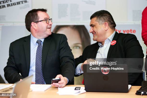 Labour's Rongotai candidate Paul Eagle and MP Grant Robertson talk in between making campaign calls at Eagle's phone bank on September 21, 2017 in...