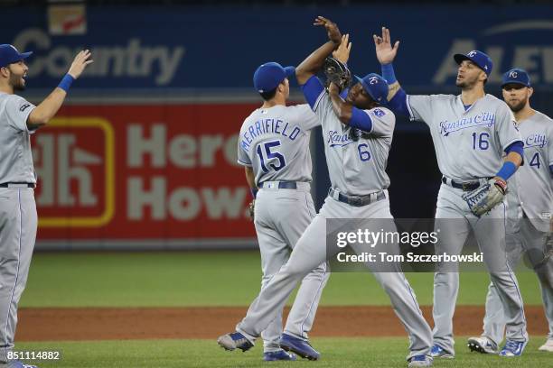 Lorenzo Cain of the Kansas City Royals celebrates their victory with teammates during MLB game action against the Toronto Blue Jays at Rogers Centre...