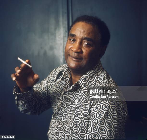 Photo of Little Brother MONTGOMERY; Posed portrait of Little Brother Montgomery, smoking cigarette