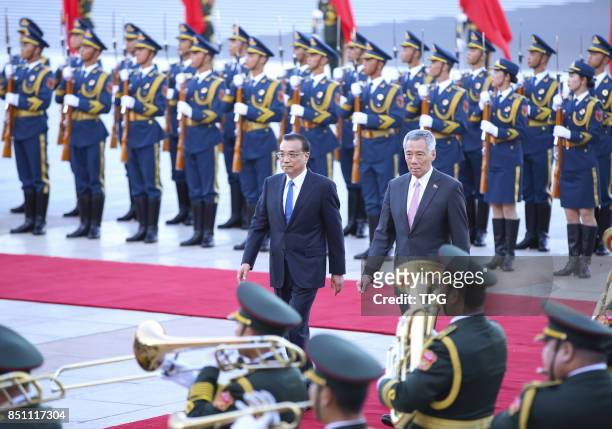 Chinese Premier Li Keqiang holds a ceremony for Singapore Prime Minister Lee Hsien Loong to welcome his official visit on Sept. 19, 2017 in Beijing,...