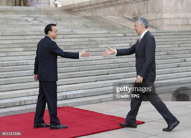 Chinese Premier Li Keqiang holds a ceremony for Singapore Prime Minister Lee Hsien Loong to welcome his official visit on Sept. 19, 2017 in Beijing,...