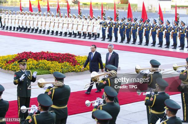 Chinese Premier Li Keqiang holds a ceremony for Singapore Prime Minister Lee Hsien Loong to welcome his official visit on Sept. 19, 2017 in Beijing,...