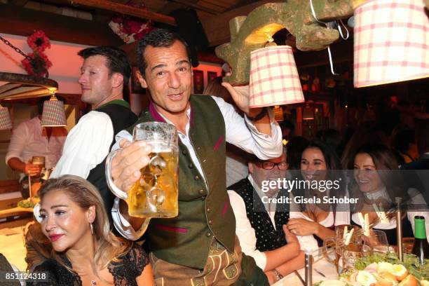 Pegah Ghaemi and Erol Sander during the Oktoberfest at Theresienwiese on September 21, 2017 in Munich, Germany.