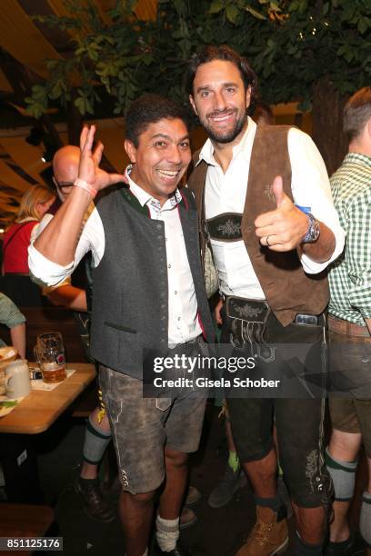 Giovane Elber and Luca Toni, former FC Bayern soccer player, during the Oktoberfest at Winzerer Faehndl tent at Theresienwiese on September 21, 2017...