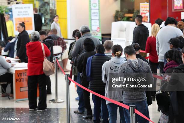 Early voters queue in Westfield Manukau City on September 22, 2017 in Auckland, New Zealand. Voters head to the polls tomorrow to elect the 52nd...