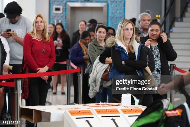 Early voters queue in Westfield Manukau City on September 22, 2017 in Auckland, New Zealand. Voters head to the polls tomorrow to elect the 52nd...