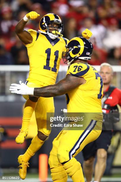 Tavon Austin of the Los Angeles Rams celebrates after a catch against the San Francisco 49ers during their NFL game at Levi's Stadium on September...