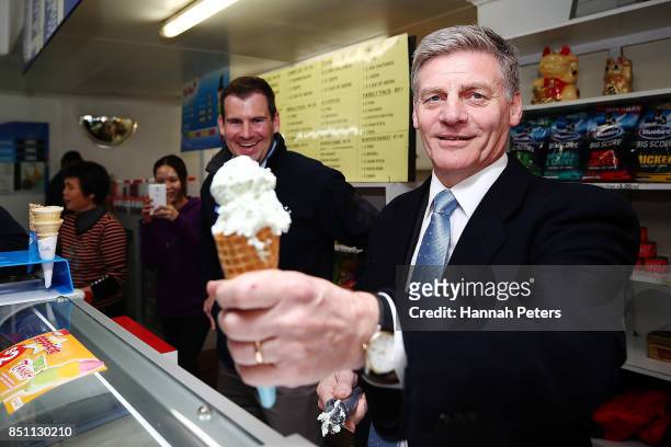 National Party leader Bill English serves ice-creams in Pokeno on September 22, 2017 in Auckland, New Zealand. Voters head to the polls on Saturday...