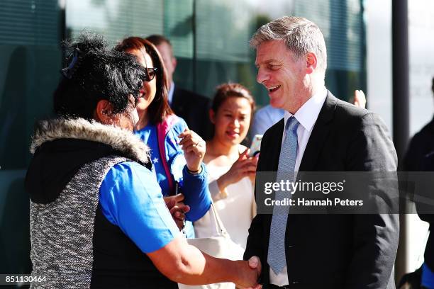 National Party leader Bill English meets supporters at Sylvia Park on September 22, 2017 in Auckland, New Zealand. Voters head to the polls on...