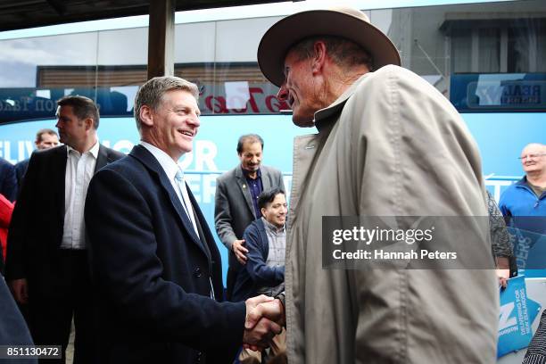 National Party leader Bill English meets supporters at Pokeno on September 22, 2017 in Auckland, New Zealand. Voters head to the polls on Saturday to...