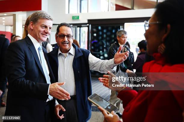 National Party leader Bill English meets supporters at Sylvia Park on September 22, 2017 in Auckland, New Zealand. Voters head to the polls on...