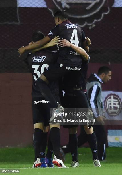 Nicolas Pasquini of Lanus celebrates with teammates after scoring the second goal of his team during the second leg match between Lanus and San...