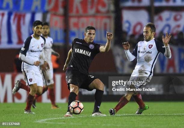 Ivan Marcone of Lanus drives the ball during the second leg match between Lanus and San Lorenzo as part of the quarter finals of Copa Conmebol...