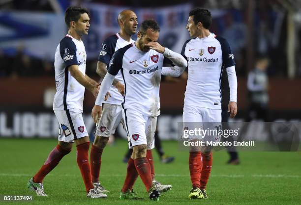 Players of San Lorenzo leave the field after the second leg match ends between Lanus and San Lorenzo as part of the quarter finals of Copa Conmebol...