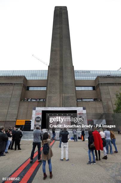 David Henshaw of Dancing Years performs outside Tate Modern, London, as part of a series of live music events organised by agit8 to raise awareness...