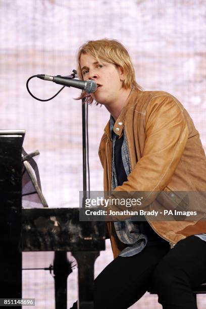 Tom Odell performs outside Tate Modern, London, as part of a series of live music events organised by agit8 to raise awareness of their campaign to...