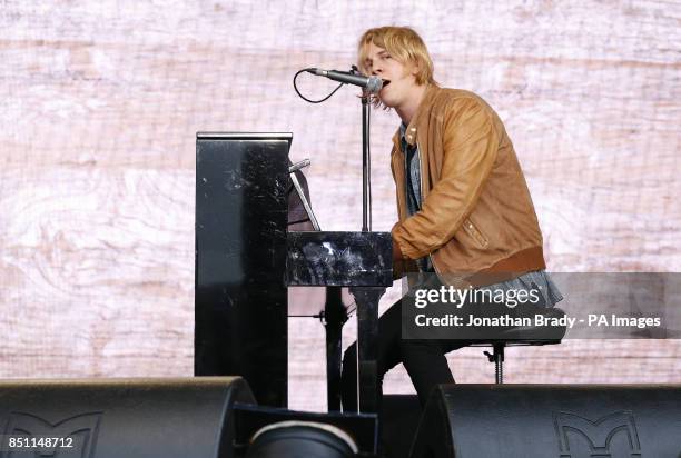 Tom Odell performs outside Tate Modern, London, as part of a series of live music events organised by agit8 to raise awareness of their campaign to...