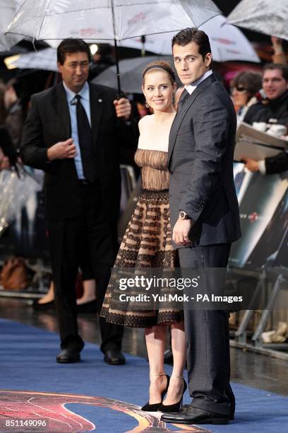 Amy Adams and Henry Cavill arriving for the European premiere of Man of Steel at the Odeon Leicester Square, London