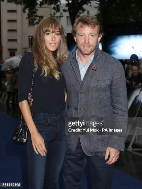 Guy Ritchie and girlfriend Jacqui Ainsley arriving for the European premiere of Man of Steel at the Odeon Leicester Square, London