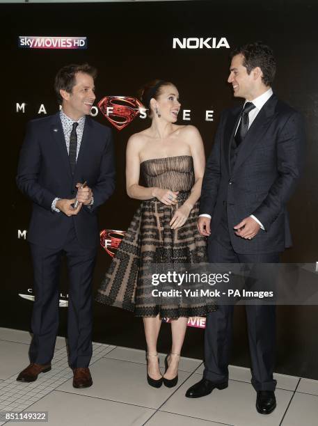 Zack Snyder, Amy Adams and Henry Cavill arriving for the European premiere of Man of Steel at the Odeon Leicester Square, London