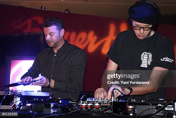 Photo of CHEMICAL BROTHERS and Tom ROWLANDS and Ed SIMONS, Ed Simons and Tom Rowlands Djing on stage at the Clore Ballroom