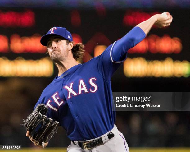 Cole Hamels of the Texas Rangers delivers against the Seattle Mariners in the first inning at Safeco Field on September 21, 2017 in Seattle,...