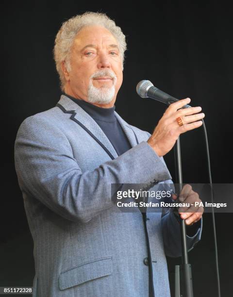 Tom Jones performs outside Tate Modern, London, as part of a series of live music events organised by agit8 to raise awareness of their campaign to...