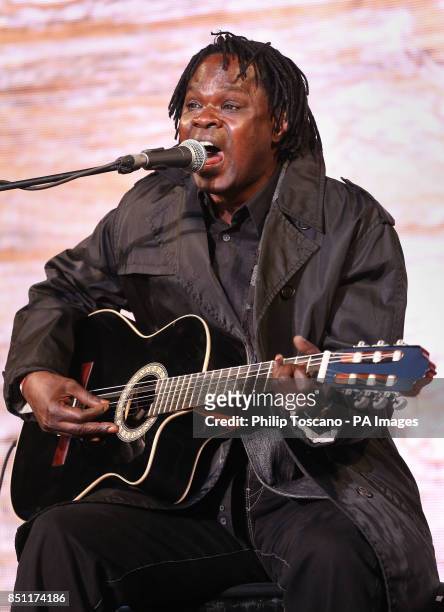 Baaba Maal performs outside Tate Modern in London, as part of a series of live music events organised by agit8 to raise awareness of their campaign...