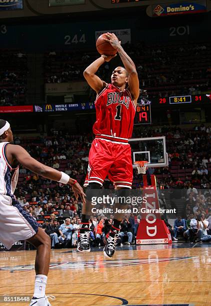 Derrick Rose of the Chicago Bulls shoots against the New Jersey Nets during the game at the Izod Center February 25, 2009 in East Rutherford, New...
