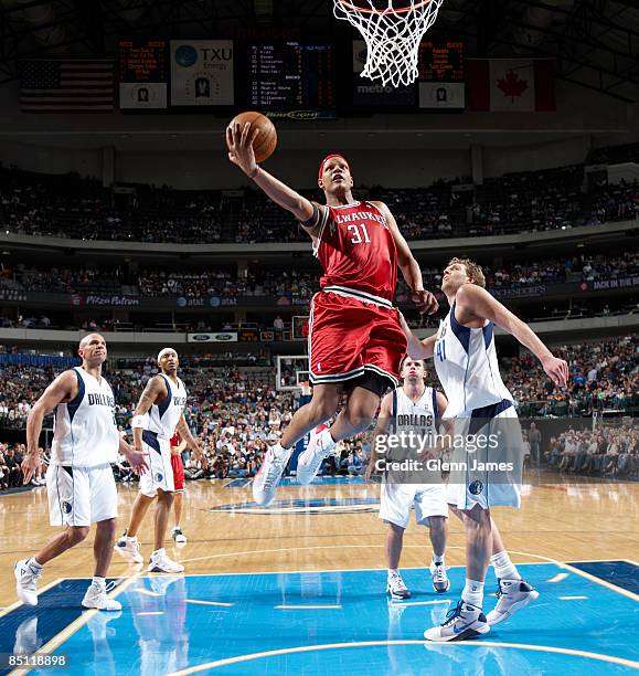 Charlie Villanueva of the Milwaukee Bucks goes in for the layup against the Dallas Mavericks at the American Airlines Center February 25, 2009 in...