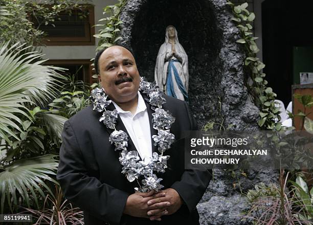 Martin Luther King III gestures as he visit the Mother Teresa House, at the Missionaries of Charity in Kolkata on February 26, 2009. Martin Luther...