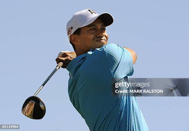 World number one Tiger Woods tees off on the 2nd hole during his matchplay game against Brendan Jones of Australia on day one of the Accenture Match...