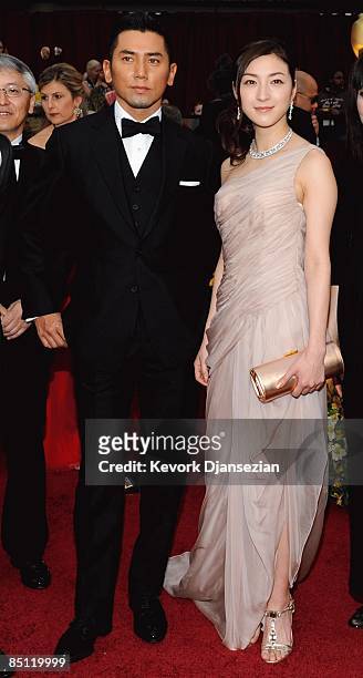 Actors Masahiro Motoki and Ryoko Hirosue from the movie "Departures" arrive at the 81st Annual Academy Awards held at Kodak Theatre on February 22,...
