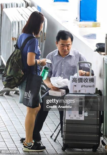 Customers are seen at the Apple store on September 22, 2017 in Hong Kong, China. Apple's iPhone 8 and iPhone 8 Plus went on sale in China today.