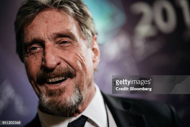 John McAfee, founder of McAfee Associates Inc. And chief cybersecurity visionary at MGT Capital Investments Inc., speaks during a Bloomberg...